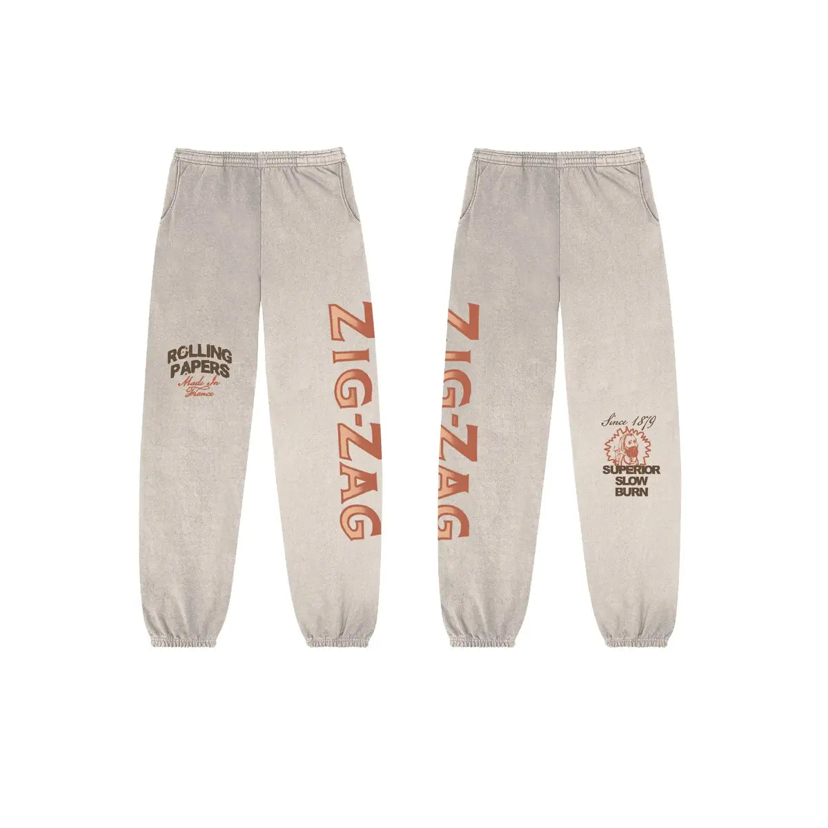 Zig-Zag beige sweatpants featuring bold logo text and vintage-inspired graphics on both legs.