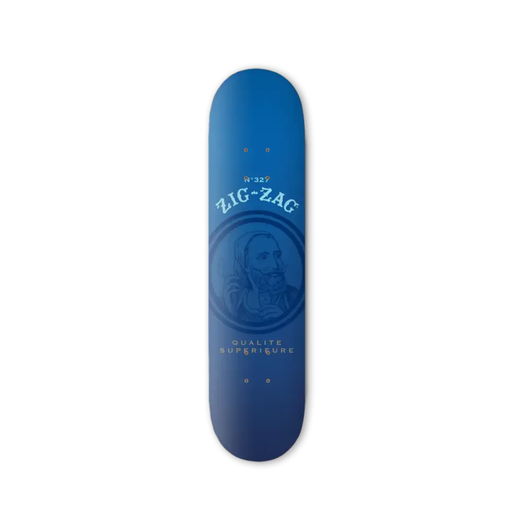 Blue Zig-Zag skateboard deck featuring an image of a bearded man and the text "Qualité Supérieure"