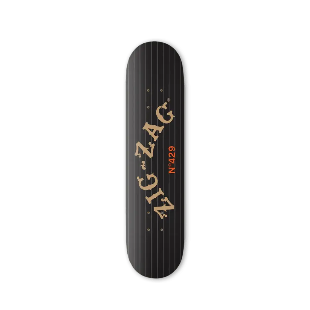 Black skateboard deck featuring gold "Zig-Zag" lettering with red "N°429" on a subtle pinstripe background