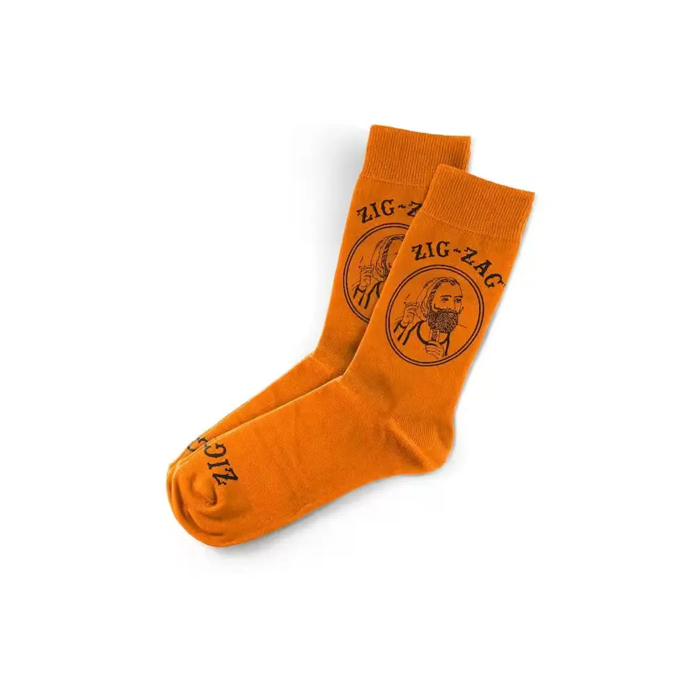 Orange socks with black "Zig-Zag" logo & bearded man illustration on the sides